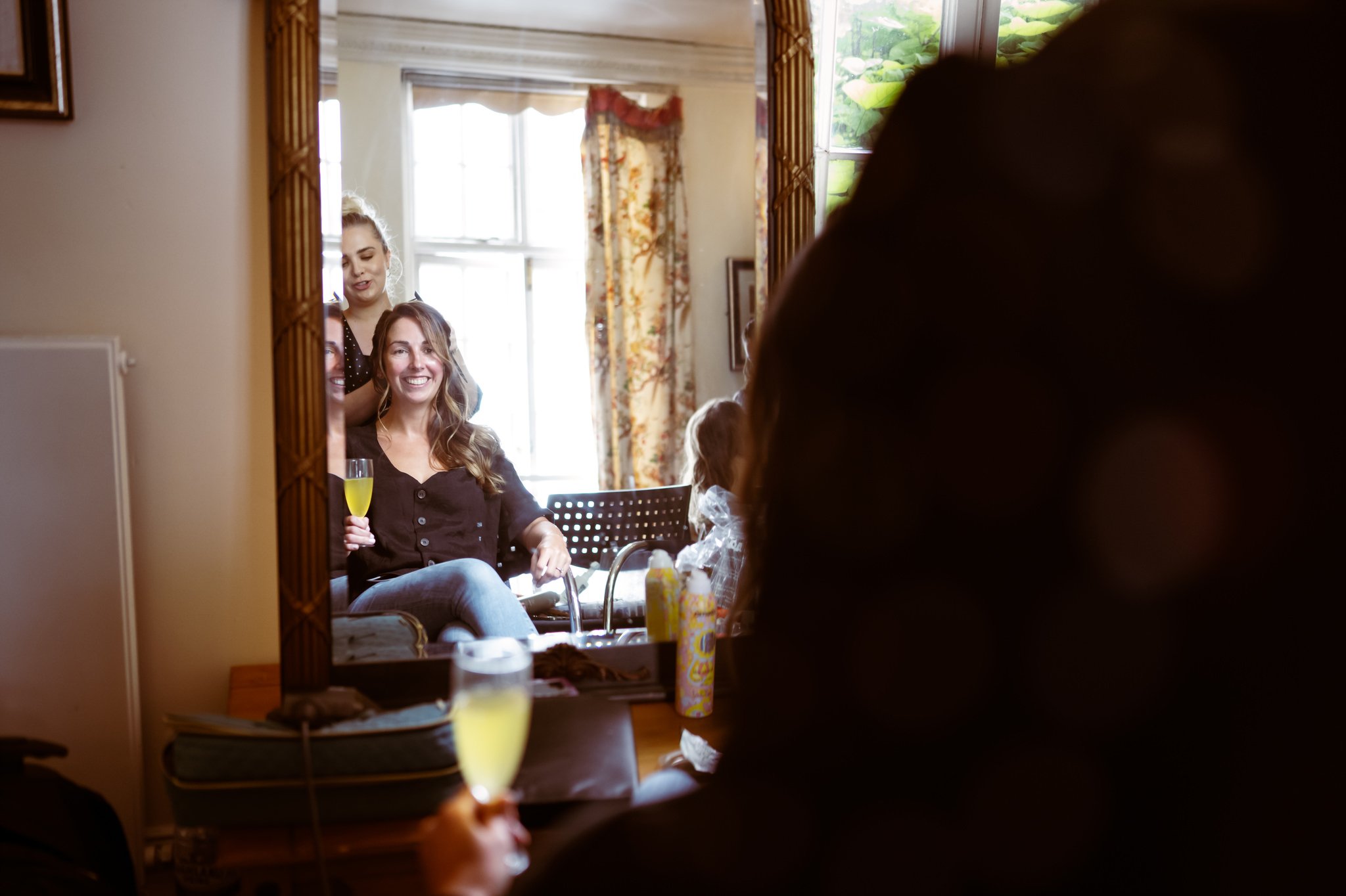 The Bride gets ready on the morning of her wedding day at Hitchin Priory.