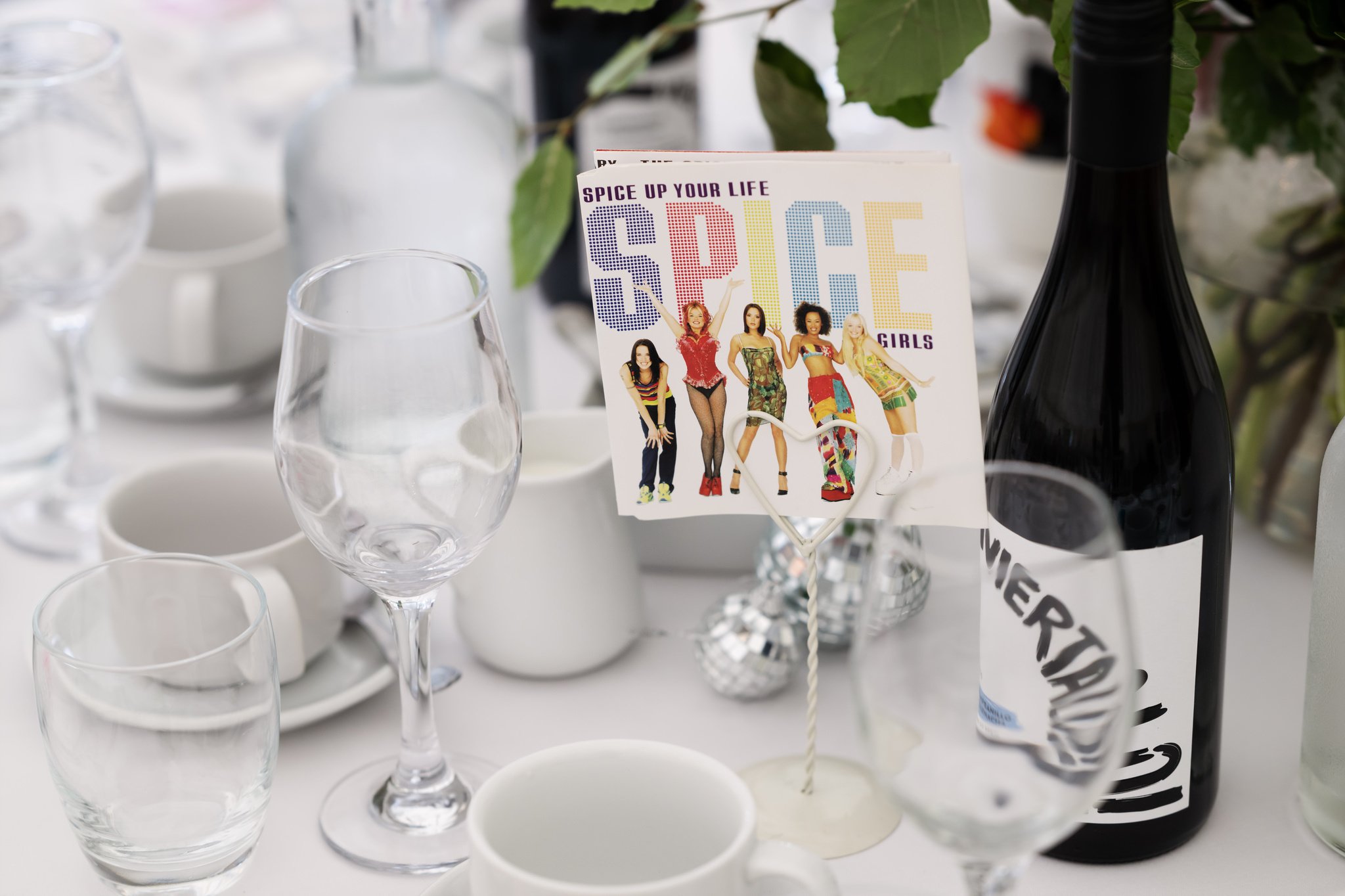 CD cover artwork used for a table centrepiece at a wedding.