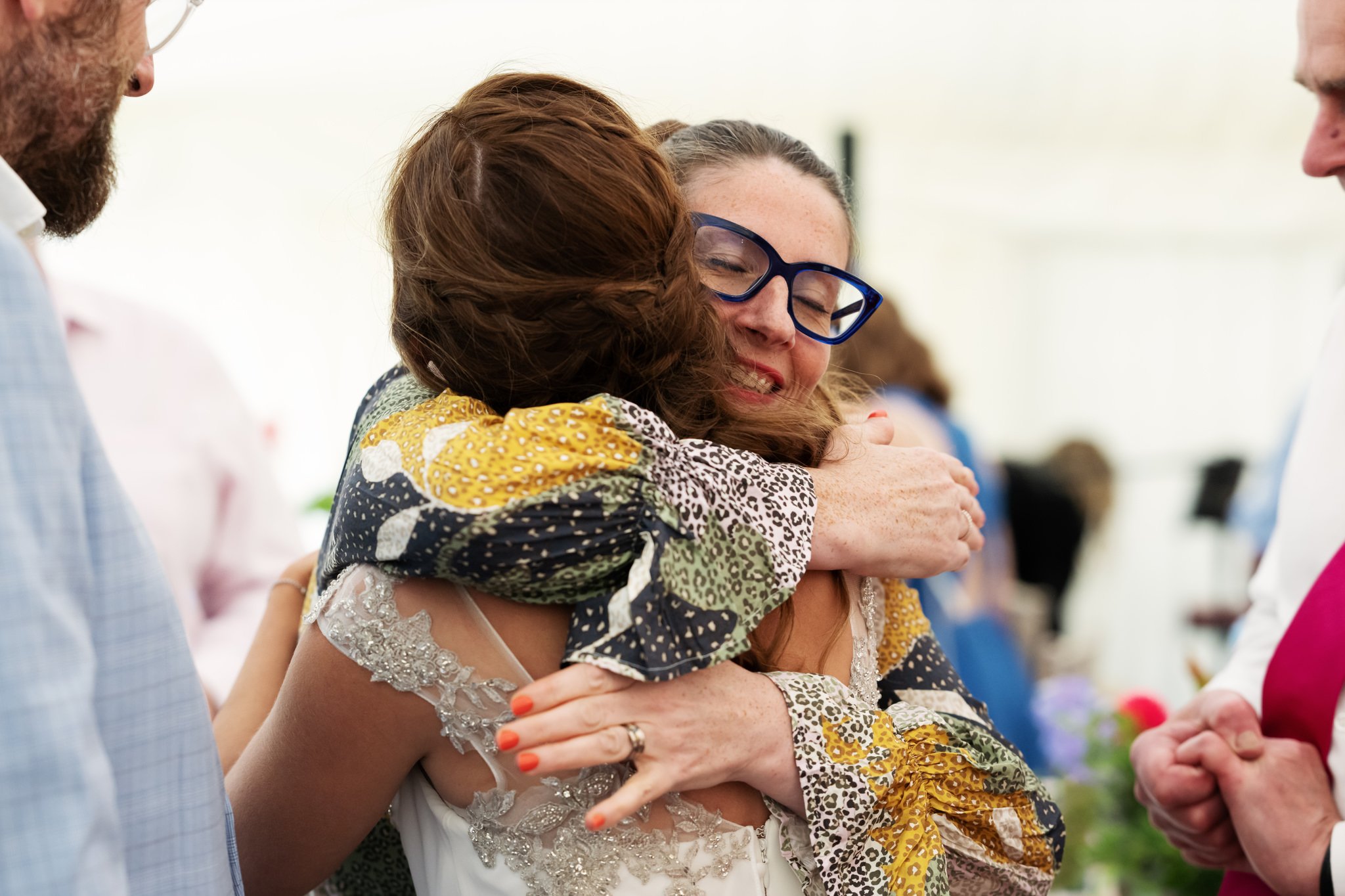 Hugs at a Hitchin Priory wedding.