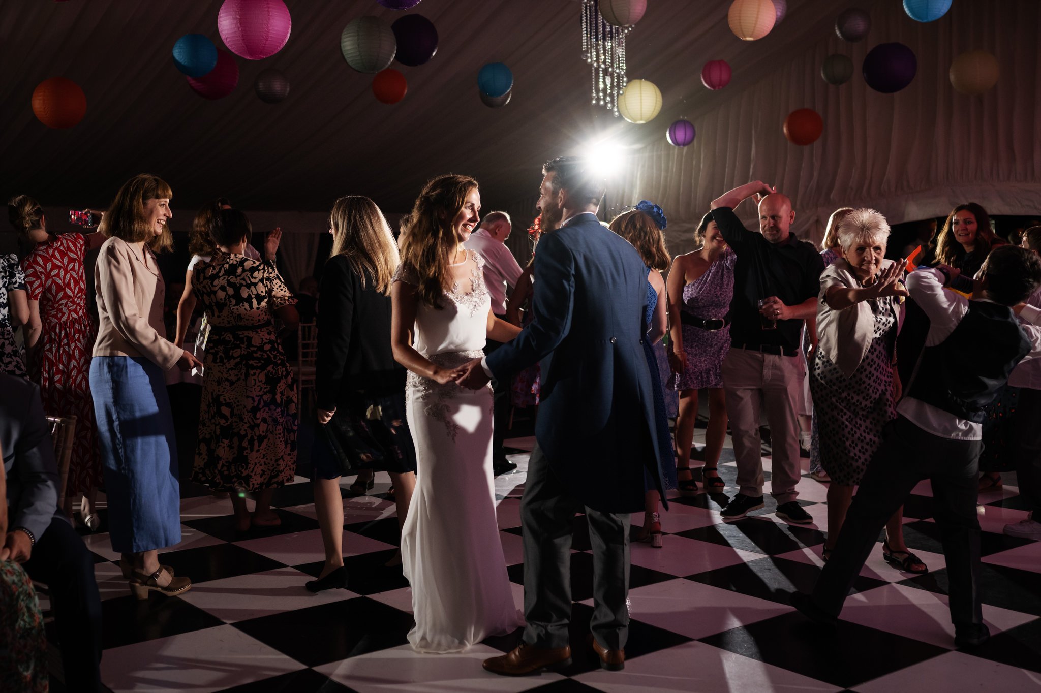 The bride and groom dancing on the dance floor at the Hitchin Priory wedding.