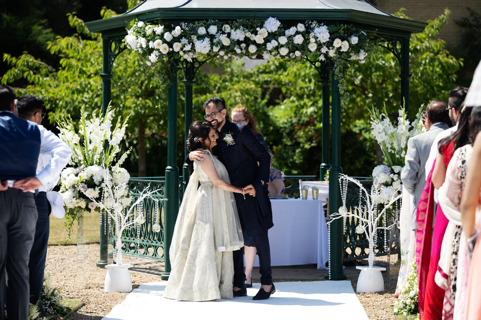 An outdoor wedding ceremony at Shendish Manor