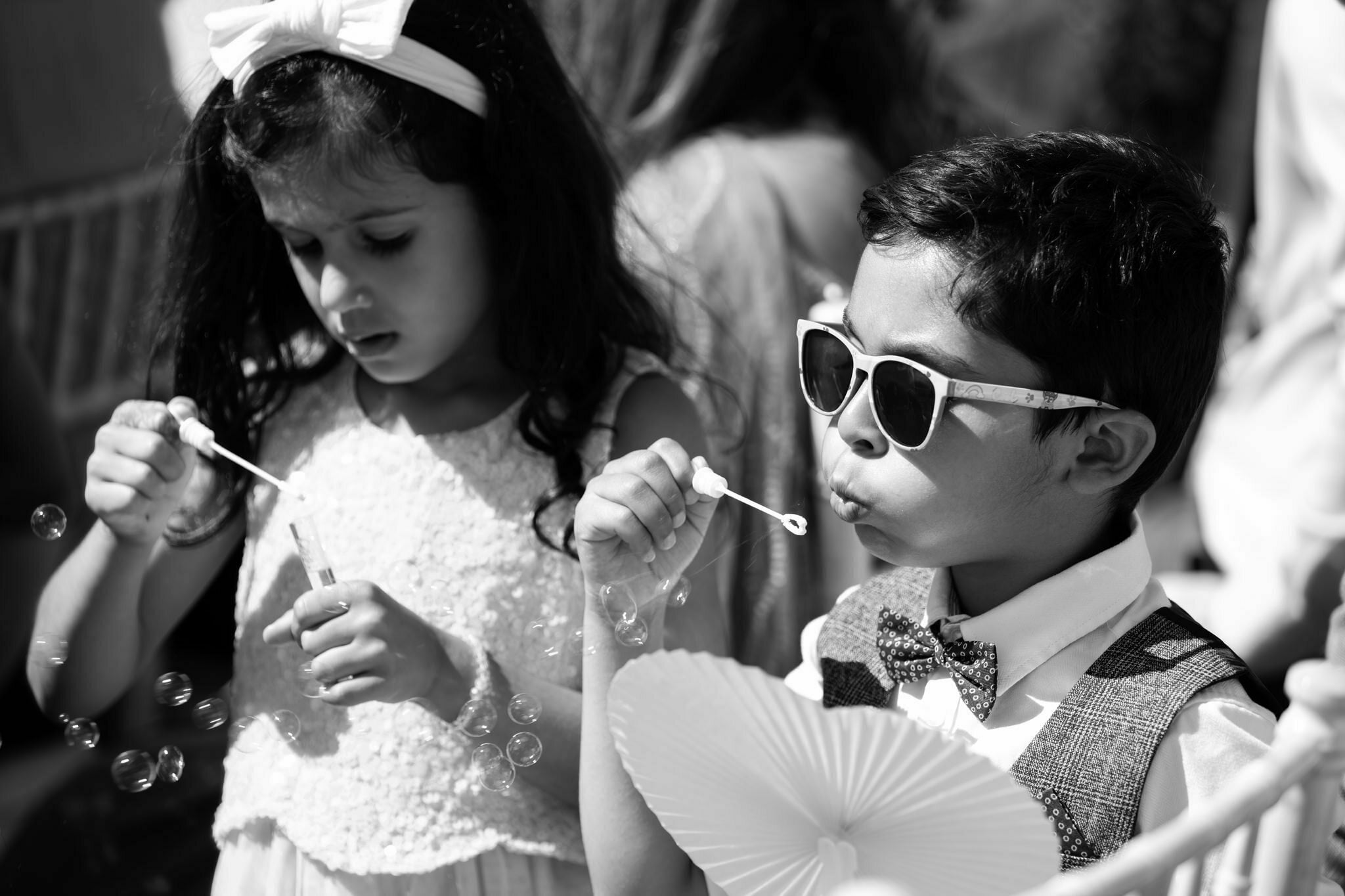 Kids blowing bubbles.