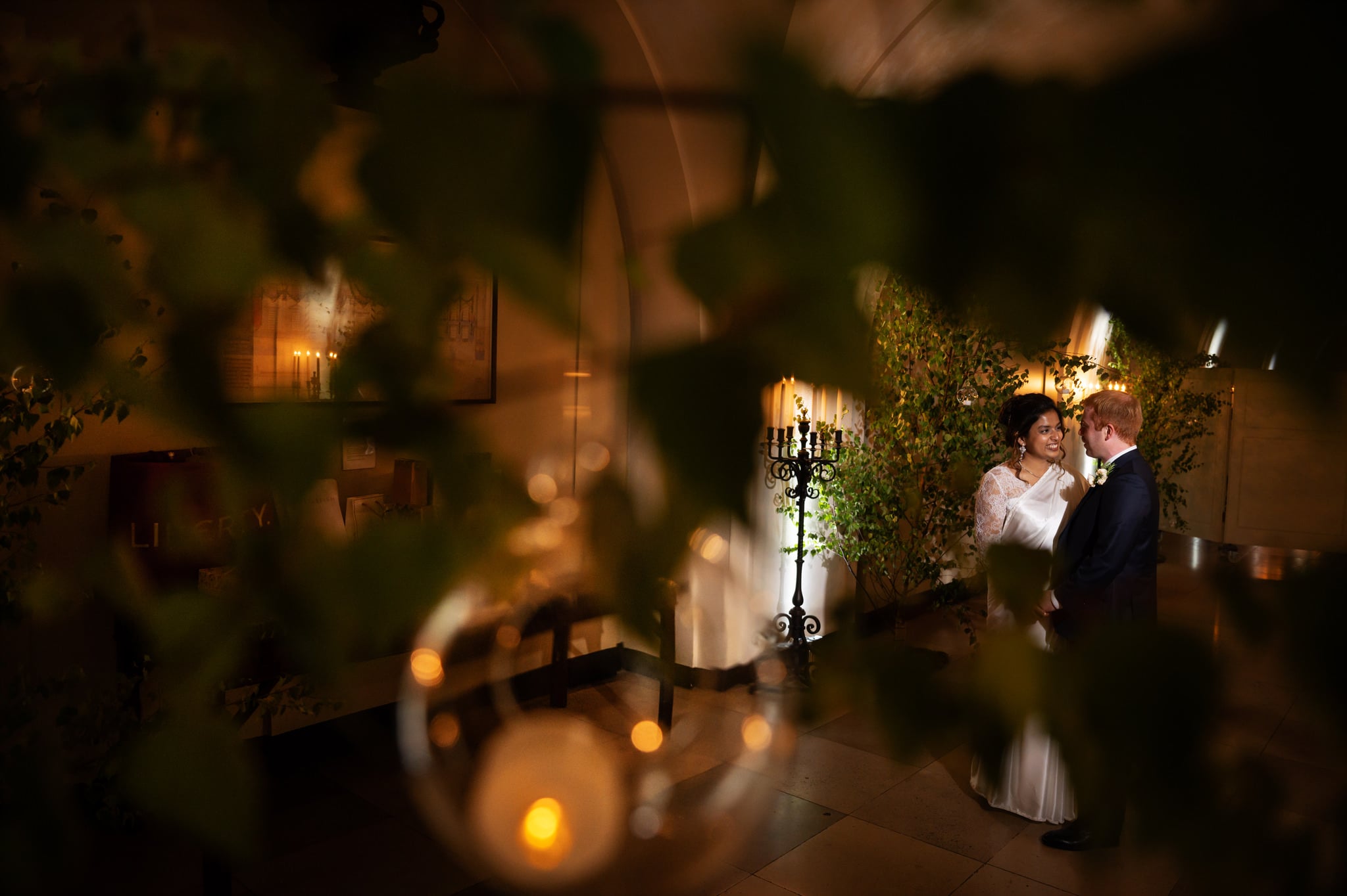 A portrait of the bride and groom in the Undercroft at banqueting house.
