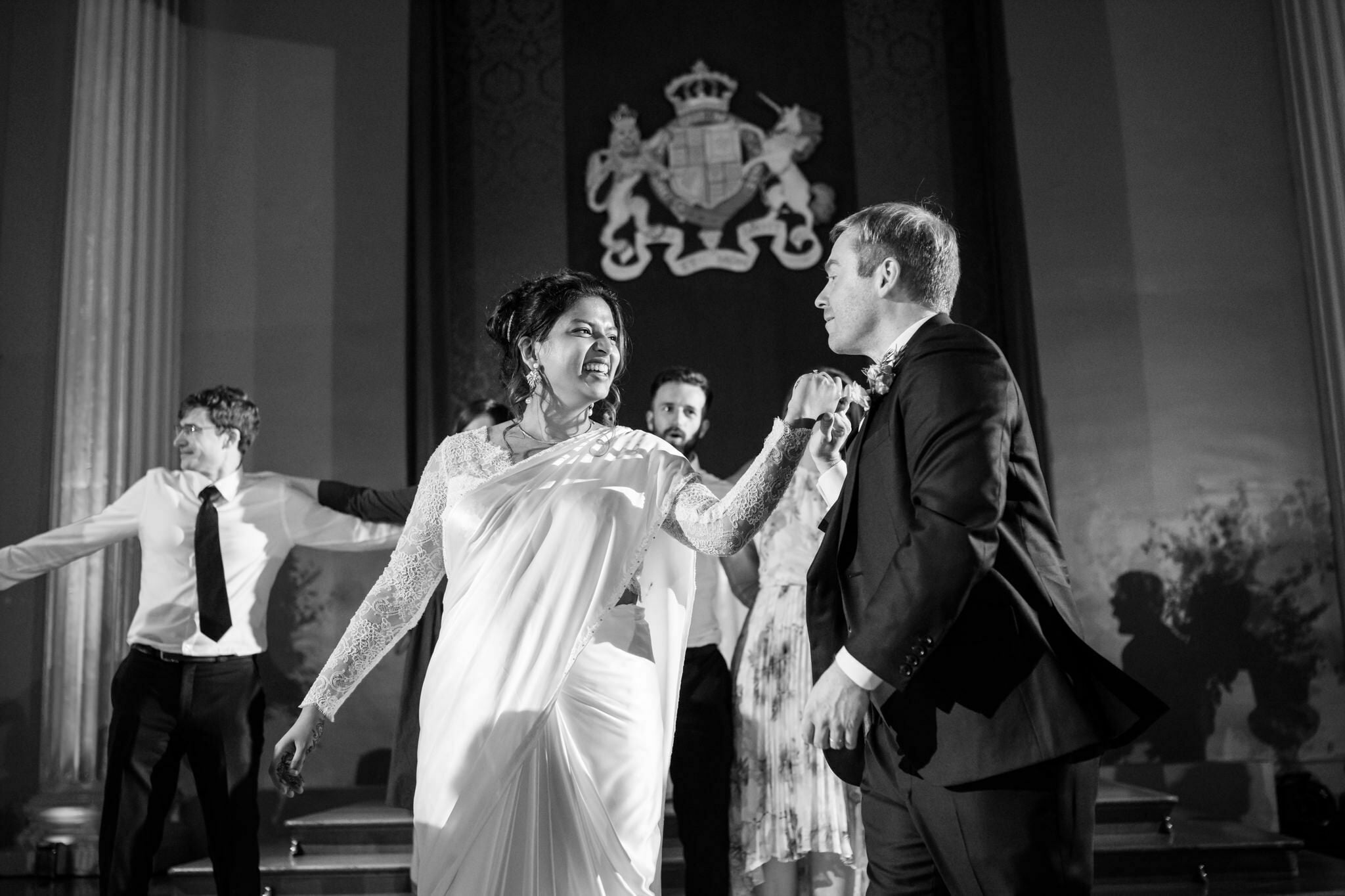The bride and groom dancing to London wedding.