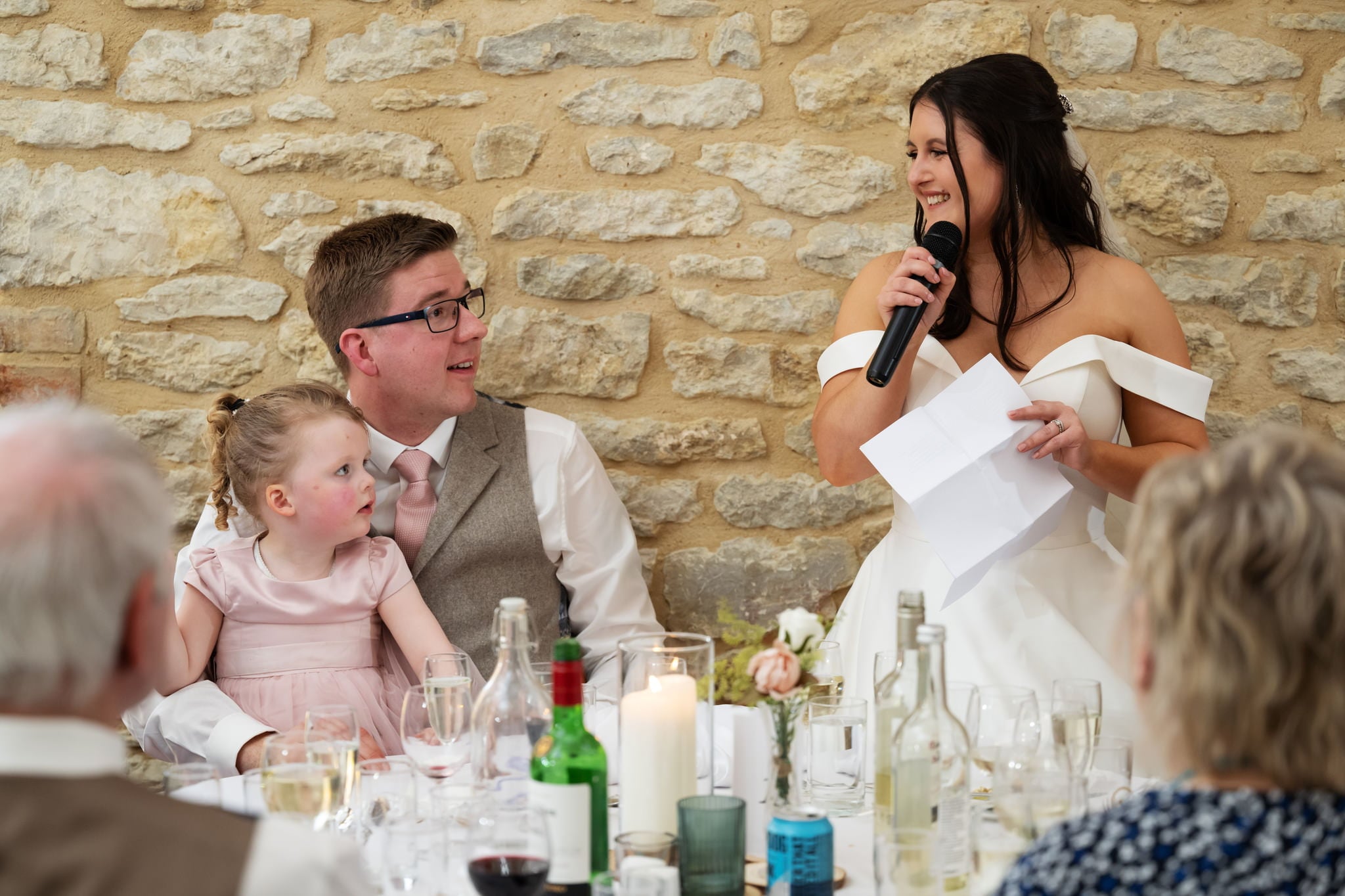 A bride delivering a speech at Huntsmill Farm wedding reception, captured by a skilled photographer.