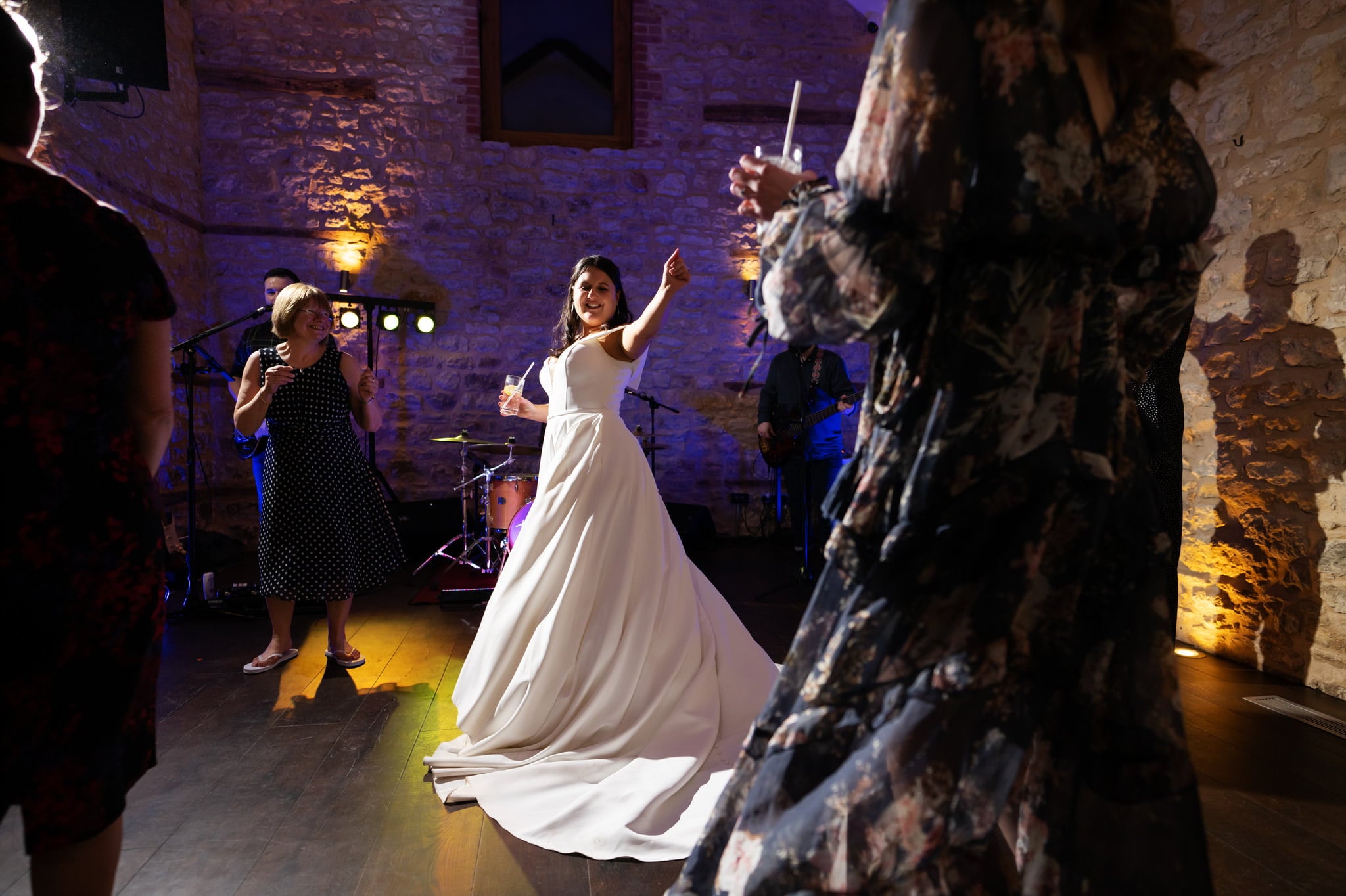 A bride gracefully dancing at a wedding captured by Huntsmill Farm Wedding Photographer.