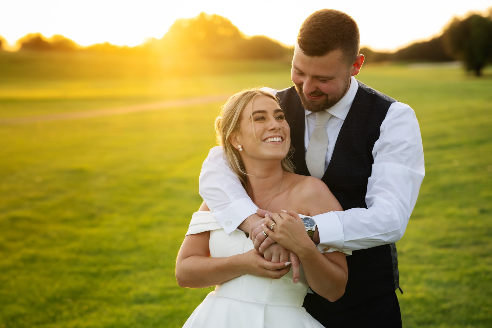 Bride and groom at golden hour at their Hertfordshire wedding