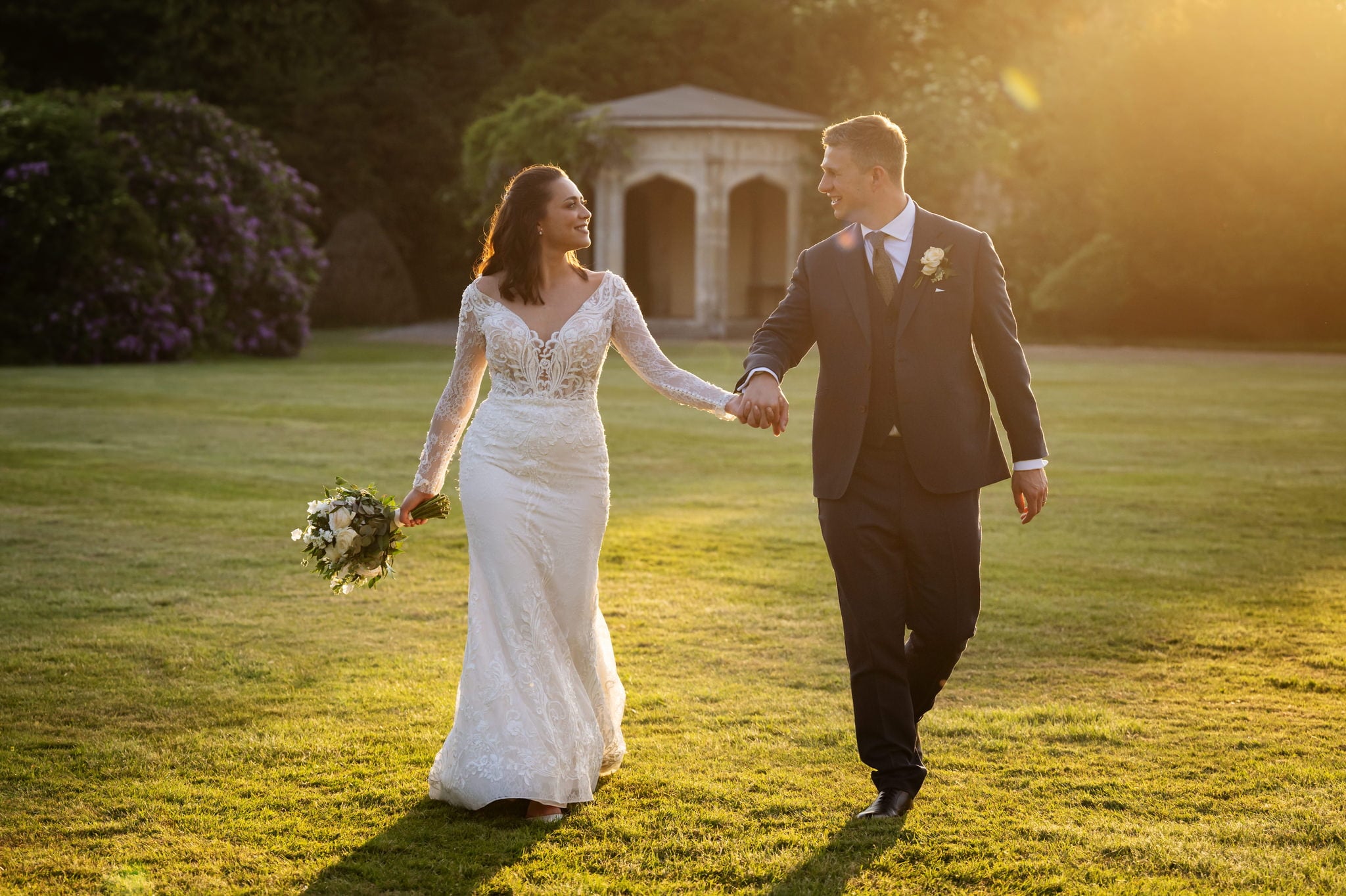 A bride and groom portrait at Shendish Manor during golden hour