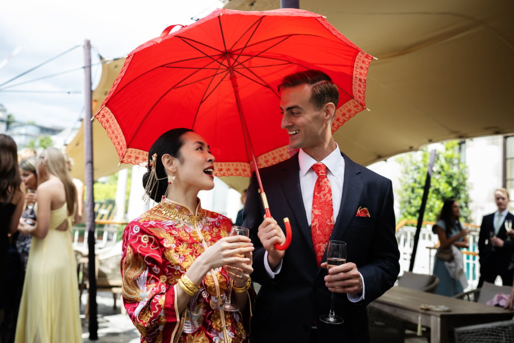 A candid shot of the bride and groom at their Chinese wedding at No. 4 Hamilton Place.