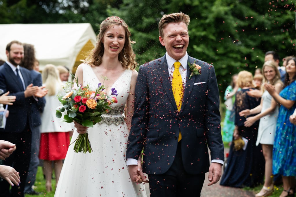 Bride and groom showered with confetti at Aylesbury wedding