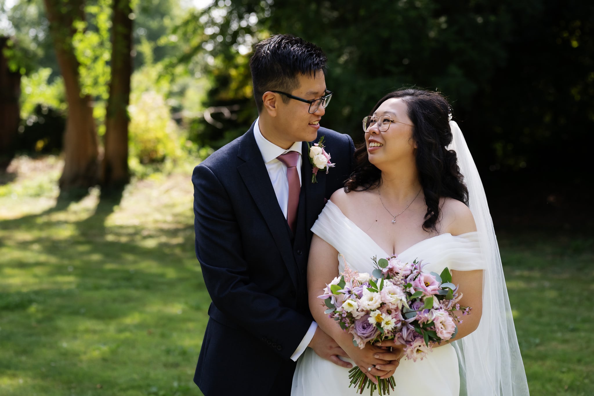Bride and groom portrait in the gardens at St Michael’s Manor Hotel